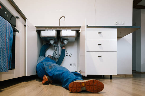 Professional Emergency Plumber technician working in Taylor, PA